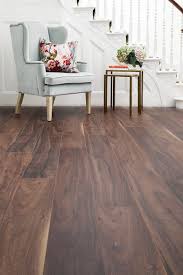 Aqualock 12mm Laminate Flooring Autumn Haze Oak Has A Striking Vintage Look And Features Planks In Different Brown Laminate Flooring Laminate Flooring Flooring