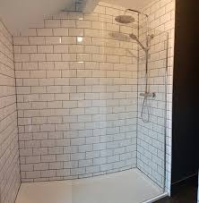Shower Room With Sloping Ceiling White Subway Tiles And Dark Grout Floor Board Effect Planks And Dark Grey White Tile Shower Shower Room White Floorboards