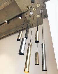 Timo Brass Pendant Light By Birgit Israel Tubular Pendant Light In Polished Brass All Sizes Come With An Adjustable Pendant Light Brass Pendant Light Light
