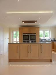 Suspended Ceiling With Lights And Flat Extractor Hood Over Kitchen Island Modern Kitchen Design Small Cottage Kitchen Kitchen Design Trends