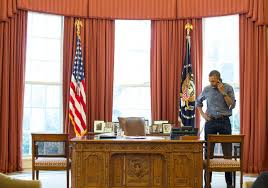 President Donald Trump Gives Oval Office A Sparkling Makeover As He Re Installs Golden Drapes Ditches Obama S Rug And Puts Churchill Bust Back On Display