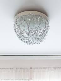 How To Make A Diy Chandelier In An Hour More Diy Chandelier Diy Apartment Decor Diy Lighting