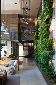 Check Out This Brooklyn Hotel S Dramatic Living Wall Installation Living Wall Indoor Plant Office Design Brooklyn Hotels