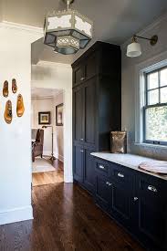 A Dark Blue Kitchen With Dark Wood Flooring Wood Floor Kitchen Dark Blue Kitchens Dark Wood Kitchens