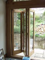 Folding Doors To Separate Living Room From Kitchen Folding Doors Door Design Sliding Patio Doors