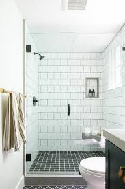 Cottage Bathroom Boasts Black Grid Floor Tiles With White Square Wall Tiles Completed With An Oil Rubbe In 2020 Shower Wall Tile Black Tile Bathrooms White Tile Shower