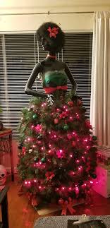 Look At The Fabulous Lady Kwanzaa Tree Designed By Rochelle La Rue Williams Who Diy Kwanzaa Decorations Christmas Crafts Decorations Dress Form Christmas Tree