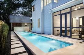 This New Construction Bungalow Boasts Beautiful Modern Style Inside And Out Vertical Windows Were A Exterior Design Backyard Ocean Front Homes Exterior Design