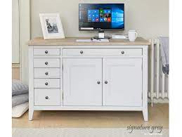 Creating a dedicated office space in your home is often tricky unless you have a spare room in which to get organised. Baumhaus Signature Painted Grey Hidden Home Office Desk From The Bed Station
