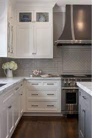 white cabinets and gray subway tile