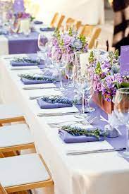 Photo about wedding table decoration with candle in lilac color. Lavender Table Setting Wedding Table Settings Wedding Table Centerpieces Lilac Wedding