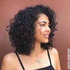 Curls on short natural hair. 50 Newest Curly Bob Hairstyles Julie Il Salon In 2020 Medium Curly Hair Styles Short Layered Curly Hair Curly Bob Hairstyles