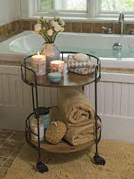 Brighten up your bathroom with our array of bathroom accessories. Astoria Rolling Accent Table Rustic Side Table Budget Home Decorating Bathroom Decor
