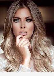 A light brown with some golden highlights would bring out the blue in the eyes. Blue Eyes And Cute Hair Color Fall Blonde Hair Dark Blonde Hair Color Light Brown Hair