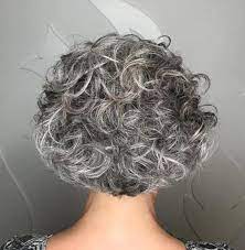 The curls are held up high while the sides are shaved. 80 Best Hairstyles For Women Over 50 To Look Younger In 2020