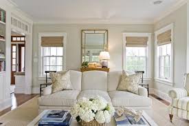 Beautiful Living Room Features Walls Painted Light Khaki Benjamin Moore Nantucket Breeze Framing Sash Windows Dressed In Wo Home Living Room Home Family Room
