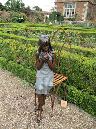 Girl On Seat Doddington Hall S Sculpture In The Garden With Doddington Church In The Background Lincolnshire Girl Sculpture
