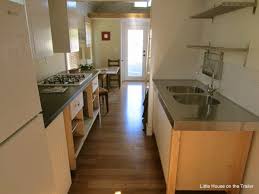 Single wides, also known as single sections, range from the highly compact to the very spacious and come in a variety of widths, lengths and bedroom to bathroom configurations. One Bedroom Home Little House On The Trailer Tiny House Kitchen Tiny House Living Tiny House Plans