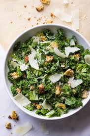 Jump To Recipe Print Recipe Kale And Romaine Caesar Salad Tossed In A Garlicky Greek Yogurt Caesar Dressing W Kale Caesar Salad Caesar Salad Recipe Leafy Salad
