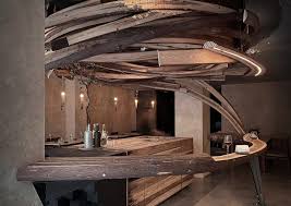 The Structure Which Curvink Architects Says Could Also Be Likened To A Bird S Nest Or Whirlpool Sits Over The B In 2020 Hotels Design Restaurant Interior Wood Planks