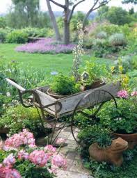 9 Vintage Garden Ideas That Will Improve Your Outdoor View Talkdecor Garden Containers Vintage Outdoor Planter Garden Cart