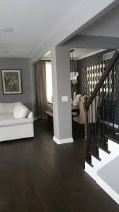 Gray Walls And Dark Wood Floors Fashionshoot Fashioninsta Fashiontrend Fashionwo Dark Wood Floors Living Room Grey Walls Living Room Dark Brown Wood Floors