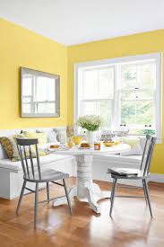 These Warm Paint Color Ideas Will Make Your Home Feel Extra Cozy Yellow Dining Room Warm Paint Colors Paint Colors For Living Room
