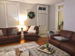 Sherwin Williams Repose Grey Paint Brown Leather Couch Recliner And Love Seat Boxwood Wrea Brown Couch Living Room Living Room Grey Grey Paint Living Room