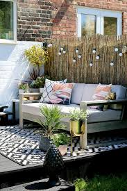 Swoonworthy Boho Garden Makeover Featuring Reed Screening Outdoor Sofa And Outdoor Rug Patio Garden Design Patio Design Garden Makeover