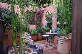 This Small Courtyard Garden Is A Good Example Of Clever Design And Use Of A Collection Of New And Old Small Courtyard Gardens Moroccan Garden Courtyard Garden
