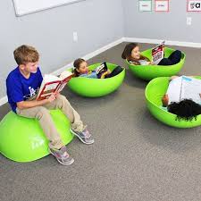 Kinesthetic Classrooms With Standing Desks Flexible Seating Wobble Chairs Pedal Desks And Bike Desks A Preschool Classroom Modern Classroom Flexible Seating