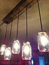 15 Diy Light Fixtures To Obsess Over Diy Light Fixtures Mason Jar Light Fixture Pallet Light