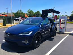 View 20 used tesla model x p100d cars for sale starting at $61,992. Tesla Model X Suv And Supercharger Review Business Insider