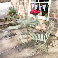 A Timeless Set Consisting Of A Round Table And Two Chairs Beautifully Designed Garden Furniture Made F Outdoor Patio Decor Garden Table And Chairs Bistro Table