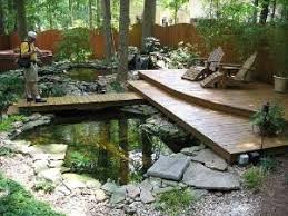 Backyard Ponds Backyard Garden Design With Japanese Koi Ponds With Natural Materials By Hercio Dias Garden Pond Design Ponds Backyard Water Features In The Garden