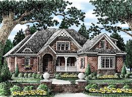 Arched doorways draw one into the house. French Country House Plans Frank Betz Associates