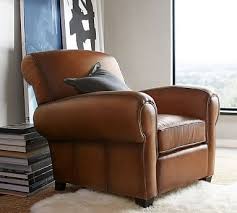Combining soft, inviting leather or mohair with the sleek form of molded wood, the eames lounge chair and ottoman is the culmination of the eameses' efforts to. Manhattan Leather Armchair Pottery Barn