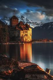 Chillon Castle Sits On A Rocky Islet Along The Shores Of Lake Geneva Switzerland Beautiful Castles Beautiful Places On Earth Castle