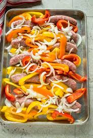 Easy Sausage And Peppers Roast Them In The Oven In One Pan The Best Sausage And Peppers Ever Ready I Stuffed Peppers Sausage Dinner Italian Sausage Recipes