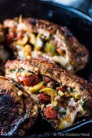 Stuffed Spanish Pork Chops Easy Recipe The Endless Meal Recipe Easy Pork Chop Recipes Dinner Recipes Olive Recipes