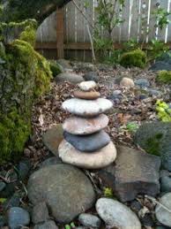 Stone Cairns Gave Me A Good Excuse Not To Shovel Gravel At Least For A Day Stone Cairns Rock Garden Landscaping Rock Garden