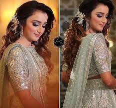 If your wedding attire has a tight bodice, this hairstyle works well as it adds shape at the nape of your neck while still staying out of the way. Wedding Reception Hairstyles Trending In Indian Weddings Wedmegood
