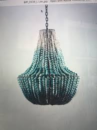 Would Have To Buy Wood Bead Chaney And Diy The Ombre Effect Beaded Chandelier Diy Chandelier Wood Pendant Light