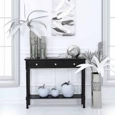Medium Black Delta Console Table French Furniture Console Tables Long and narrow light wood console table with drawers.
