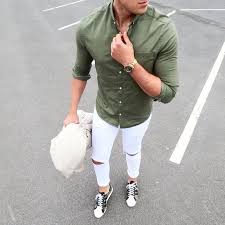 An Olive Green Shirt Ripped White Jeans And Chucks Denim Outfit Men Mens Outfits White Jeans Men
