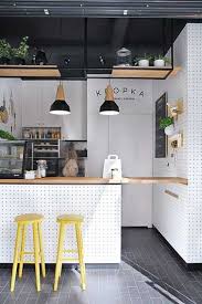 Pour Agrandir De Maniere Deco Une Petite Cuisine Ouverte L Astuce Est D Amenager Un Ilot Centa Design Interieur De Cafe Interieur De Restaurant Cuisines Design