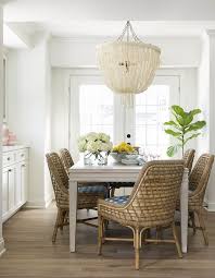 Coastal Relaxed Dining Room With Rattan Dining Chairs Pole Rattan Frame And Legs In Natural Seagrass Woven Dining Chairs Dining Room Design Coastal Dining Room