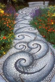 Stone Air Mosaic Picturing A Quartered Circle With Representations Of The 4 Elements Mosaic Garden Stone Walkway Pebble Mosaic
