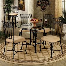 Small Wrought Iron Kitchen Table With Rounded Glass Top Combined With Artistic Dining Chairs S Glass Round Dining Table Classic Dining Room Dining Room Design