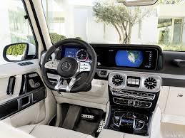 2019 Mercedes Amg G63 Mercedes Amg G 63 Exterieur Designo Mysticwei Bright Exterieur Edelstahl Paketinterie G Wagon Interior Mercedes Amg New Mercedes Amg